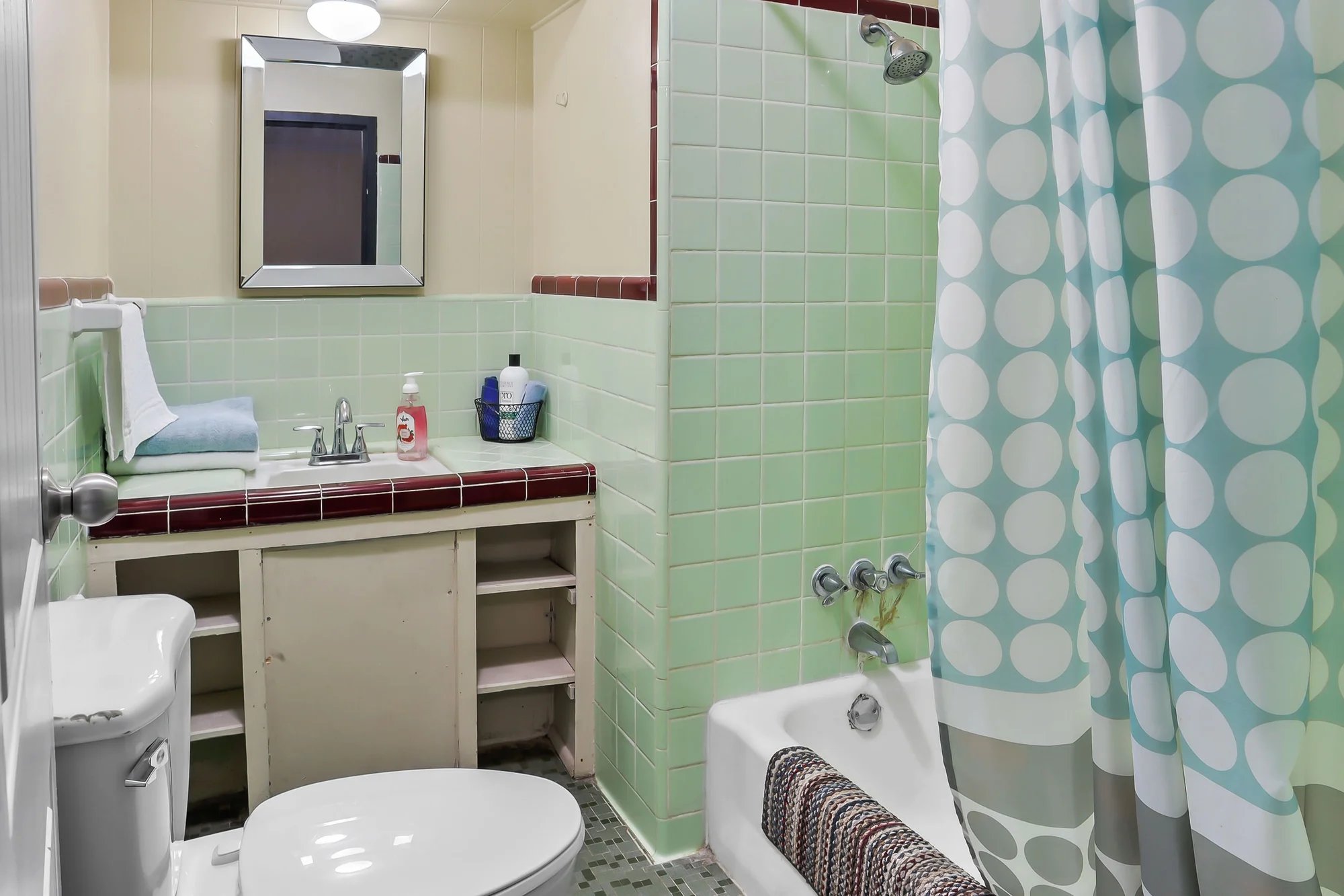 Single room with TV and fridge